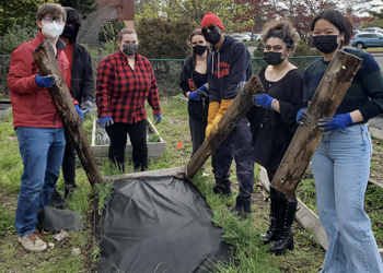 Beaverton Academy of Science and Engineering students standing in a garden